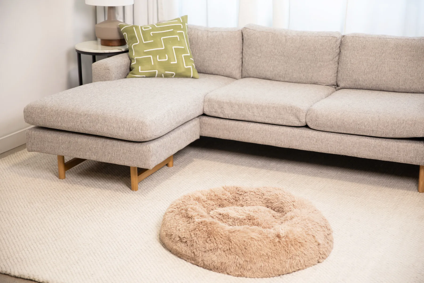 a rug on the floor of a living room